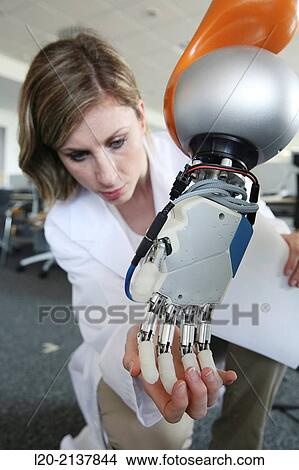 Picture - Humanoid robot for automotive assembly tasks in collaboration with people and and LWR robot, using haptic teleoperation with force feedback.. Fotosearch