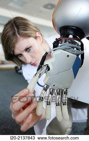 Humanoid robot for automotive assembly tasks in collaboration with people and and LWR robot, using haptic teleoperation with force feedback. View Large Photo Image Stock Image - Humanoid robot for automotive assembly tasks in collaboration with people and and LWR robot, using haptic teleoperation with force feedback.. Fotosearch