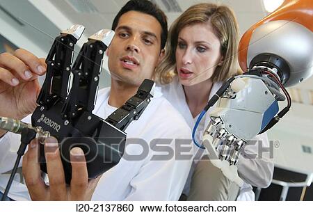 Humanoid robot for automotive assembly tasks in collaboration with people and and LWR robot, using haptic teleoperation with force feedback. View Large Photo Image Stock Image - Humanoid robot for automotive assembly tasks in collaboration with people and and LWR robot, using haptic teleoperation with force feedback.. Fotosearch