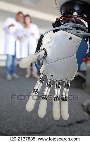Humanoid robot for automotive assembly tasks in collaboration with people and and LWR robot, using haptic teleoperation with force feedback. View Large Photo Image Stock Photo - Humanoid robot for automotive assembly tasks in collaboration with people and and LWR robot, using haptic teleoperation with force feedback.. Fotosearch