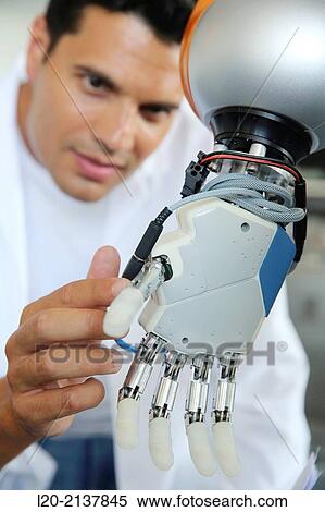 Humanoid robot for automotive assembly tasks in collaboration with people and and LWR robot, using haptic teleoperation with force feedback. View Large Photo Image Stock Photography - Humanoid robot for automotive assembly tasks in collaboration with people and and LWR robot, using haptic teleoperation with force feedback.. Fotosearch