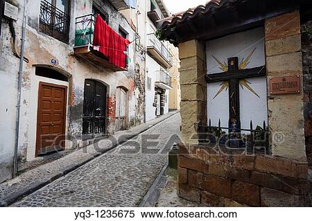 Humilladero en la calle San Juan, Castro Urdiales, Cantabria View Large Photo Image Stock Photography - Humilladero en la calle San Juan, Castro Urdiales, Cantabria. Fotosearch