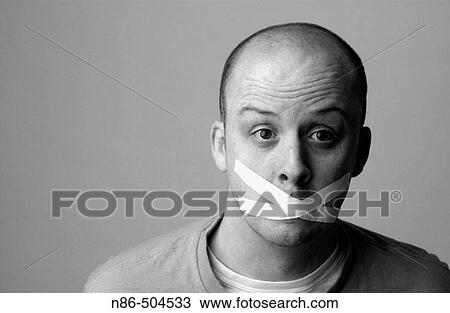 Humor, mouth taped close View Large Photo Image Stock Image - Humor, mouth taped close. Fotosearch