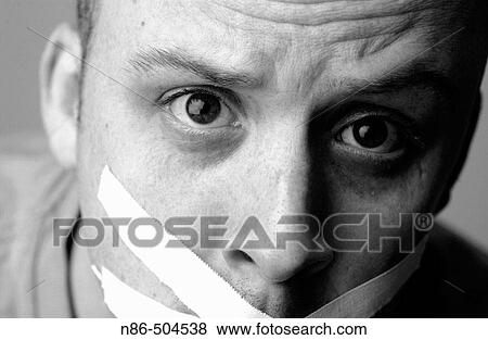 Humor, mouth taped close View Large Photo Image Stock Photo - Humor, mouth taped close. Fotosearch