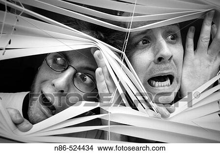 Picture - Humor, two scared men in window. Fotosearch