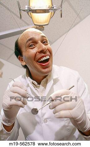 humorous dentist View Large Photo Image Stock Photo - humorous dentist. Fotosearch