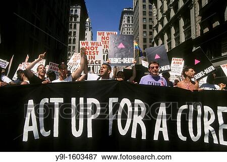 Hundreds of members of the activist group ACT UP AIDS Coalition to Unleash Power protest the lack of an effective treatment for AIDS on Fifth Avenue in June 1991 in the Gay Pride parade View Large Photo Image Stock Photo - Hundreds of members of the activist group ACT UP AIDS Coalition to Unleash Power protest the lack of an effective treatment for AIDS on Fifth Avenue in June 1991 in the Gay Pride parade. Fotosearch