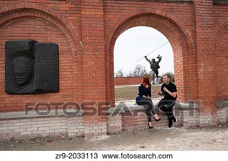 Hungarian man and woman visiting Memento Statue Park in Budapest, Hungary. View Large Photo Image Stock Image - Hungarian man and woman visiting Memento Statue Park in Budapest, Hungary.. Fotosearch