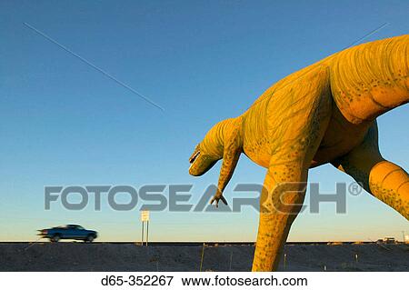 ? Hungy? dinosaur statue and vehicle on I-40, Dinosaur Park. Holbrook. Arizona, USA View Large Photo Image Stock Photo - ? Hungy? dinosaur statue and vehicle on I-40, Dinosaur Park. Holbrook. Arizona, USA. Fotosearch