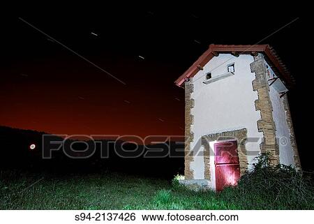 Hut at night in the field of Bustarviejo, Madrid, Spain. View Large Photo Image Stock Photograph - Hut at night in the field of Bustarviejo, Madrid, Spain.. Fotosearch