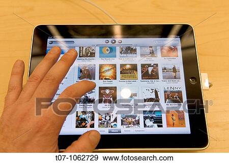 Stock Photo - I-Pad, Apple Retail Store, 5th Avenue, New York City, April 8, 2010. Fotosearch