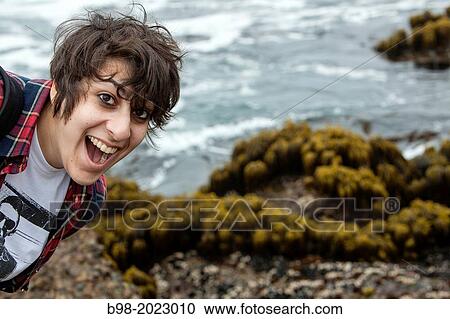 I teenage girl shows her excitement to be at the Point Lobos State Reserve, in Northern California. View Large Photo Image Stock Image - I teenage girl shows her excitement to be at the Point Lobos State Reserve, in Northern California.. Fotosearch