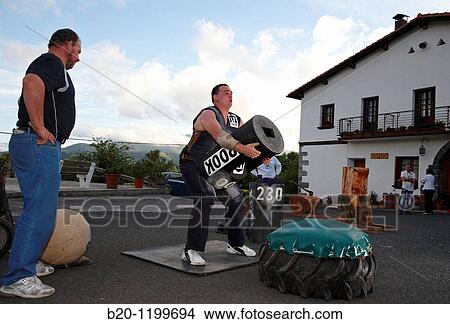 Iaki and Ignacio Perurena, Harrijasotzaile (stone lifting), Basque rural sport, Aduna, Gipuzkoa, Basque Country, Spain View Large Photo Image Picture - Iaki and Ignacio Perurena, Harrijasotzaile (stone lifting), Basque rural sport, Aduna, Gipuzkoa, Basque Country, Spain. Fotosearch