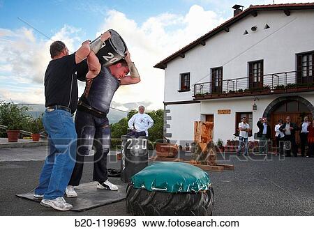 Iaki and Ignacio Perurena, Harrijasotzaile (stone lifting), Basque rural sport, Aduna, Gipuzkoa, Basque Country, Spain View Large Photo Image Stock Image - Iaki and Ignacio Perurena, Harrijasotzaile (stone lifting), Basque rural sport, Aduna, Gipuzkoa, Basque Country, Spain. Fotosearch