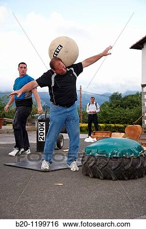 Iaki and Ignacio Perurena, Harrijasotzaile (stone lifting), Basque rural sport, Aduna, Gipuzkoa, Basque Country, Spain View Large Photo Image Stock Photograph - Iaki and Ignacio Perurena, Harrijasotzaile (stone lifting), Basque rural sport, Aduna, Gipuzkoa, Basque Country, Spain. Fotosearch