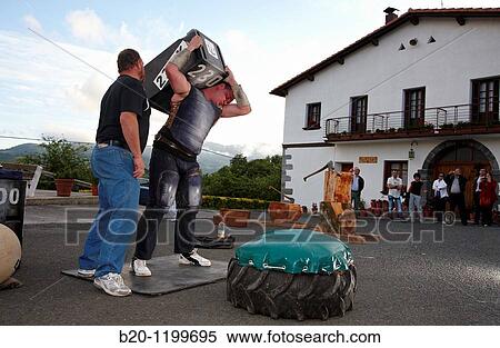 Iaki and Ignacio Perurena, Harrijasotzaile (stone lifting), Basque rural sport, Aduna, Gipuzkoa, Basque Country, Spain View Large Photo Image Stock Photography - Iaki and Ignacio Perurena, Harrijasotzaile (stone lifting), Basque rural sport, Aduna, Gipuzkoa, Basque Country, Spain. Fotosearch