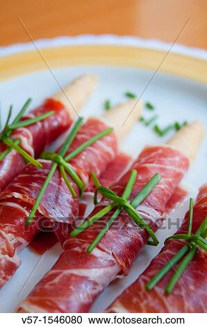 Iberian ham with asparagus. Close view. View Large Photo Image Stock Image - Iberian ham with asparagus. Close view.. Fotosearch