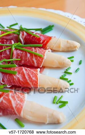 Iberian ham with asparagus. Close view. View Large Photo Image Stock Photo - Iberian ham with asparagus. Close view.. Fotosearch