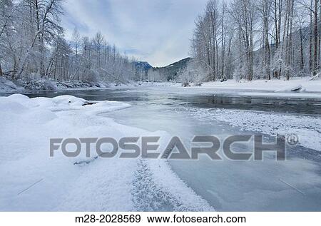 Ice and frost along the Birkenhead river near Pemberton, Coast Mountains British Columbia. View Large Photo Image Stock Photo - Ice and frost along the Birkenhead river near Pemberton, Coast Mountains British Columbia.. Fotosearch
