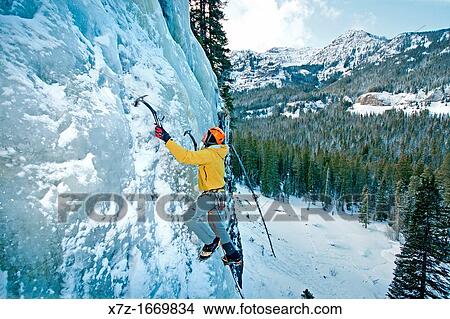 Ice climbing a route called Fat Chance which is rated WI-3 and located at the Mummy Cooler Area in Hyalite Canyon near the city of Bozeman in southern Montana View Large Photo Image Picture - Ice climbing a route called Fat Chance which is rated WI-3 and located at the Mummy Cooler Area in Hyalite Canyon near the city of Bozeman in southern Montana. Fotosearch