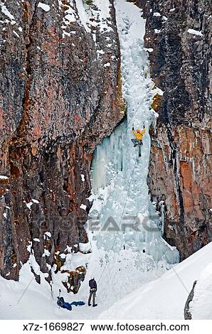 Ice climbing a route called The Elevator Shaft which is rated WI-4 and located at the Unnamed Wall in Hyalite Canyon near the city of Bozeman in southern Montana View Large Photo Image Stock Photo - Ice climbing a route called The Elevator Shaft which is rated WI-4 and located at the Unnamed Wall in Hyalite Canyon near the city of Bozeman in southern Montana. Fotosearch