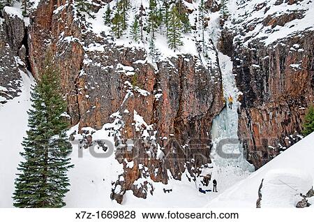 Ice climbing a route called The Elevator Shaft which is rated WI-4 and located at the Unnamed Wall in Hyalite Canyon near the city of Bozeman in southern Montana View Large Photo Image Stock Photo - Ice climbing a route called The Elevator Shaft which is rated WI-4 and located at the Unnamed Wall in Hyalite Canyon near the city of Bozeman in southern Montana. Fotosearch
