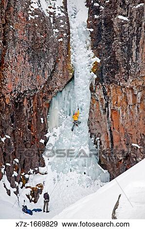Ice climbing a route called The Elevator Shaft which is rated WI-4 and located at the Unnamed Wall in Hyalite Canyon near the city of Bozeman in southern Montana View Large Photo Image Stock Photo - Ice climbing a route called The Elevator Shaft which is rated WI-4 and located at the Unnamed Wall in Hyalite Canyon near the city of Bozeman in southern Montana. Fotosearch