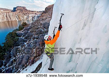 Stock Photo - Ice climbing Lower Falls Right which is rated WI-4 and located at Shoshone Falls in the Snake River Canyon near the city of Twin Falls in southern Idaho. Fotosearch