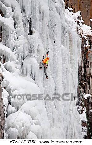 Stock Photo - Ice climbing Palisade Falls which is rated WI-4 and located in Hyalite Canyon in the Gallatin Mountains near the city of Bozeman in southern Montana. Fotosearch