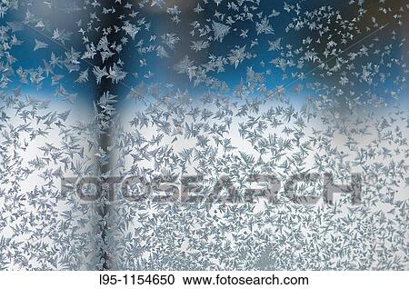 Ice crystals from humidity condensation forming outside a window glass under extremely cold temperatures, Kuhmo, Finland View Large Photo Image Stock Image - Ice crystals from humidity condensation forming outside a window glass under extremely cold temperatures, Kuhmo, Finland. Fotosearch