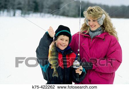 Stock Image - Ice fishing, perch. Fotosearch