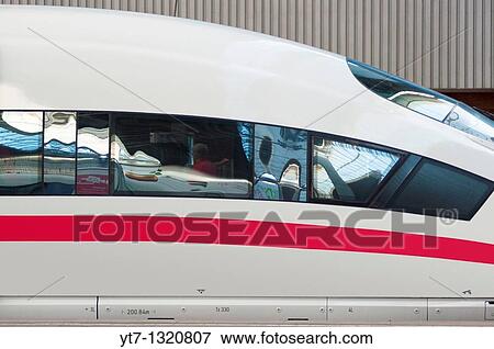 ICE, Germany's high speed intercity express train at Munich train station Germany View Large Photo Image Stock Photo - ICE, Germany's high speed intercity express train at Munich train station Germany. Fotosearch