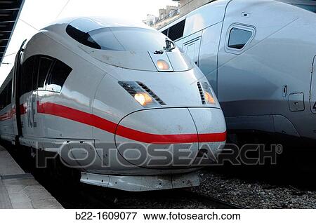 ICE (Inter-City-Express, German high-speed train) and TGV (Train? Grande Vitesse, French high-speed train), Paris Est, Gare de l? Est, Paris, France View Large Photo Image Stock Photo - ICE (Inter-City-Express, German high-speed train) and TGV (Train? Grande Vitesse, French high-speed train), Paris Est, Gare de l? Est, Paris, France. Fotosearch