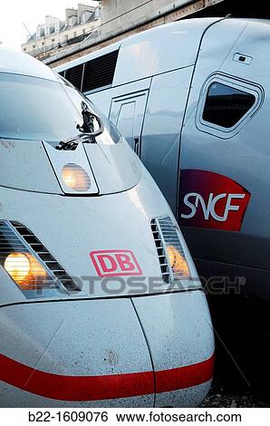 ICE (Inter-City-Express, German high-speed train) and TGV (Train? Grande Vitesse, French high-speed train), Paris Est, Gare de l? Est, Paris, France View Large Photo Image Stock Photograph - ICE (Inter-City-Express, German high-speed train) and TGV (Train? Grande Vitesse, French high-speed train), Paris Est, Gare de l? Est, Paris, France. Fotosearch