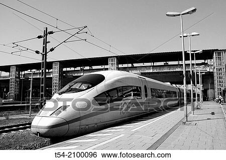 Stock Photograph - ICE train of German Bahn AG in the main station of Freiburg im Breisgau. Fotosearch