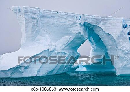 Iceberg detail in and around the Antarctic Peninsula during the summer months, Southern Ocean MORE INFO An increasing number of icebergs is being created as climate change is causing the breakup of major ice shelves and glaciers View Large Photo Image Stock Image - Iceberg detail in and around the Antarctic Peninsula during the summer months, Southern Ocean MORE INFO An increasing number of icebergs is being created as climate change is causing the breakup of major ice shelves and glaciers. Fotosearch