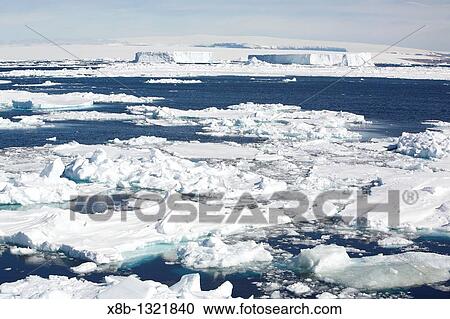 Icebergs and bergy bits floating in the Weddell Sea in and around the Antarctic Peninsula during the summer months View Large Photo Image Stock Image - Icebergs and bergy bits floating in the Weddell Sea in and around the Antarctic Peninsula during the summer months. Fotosearch