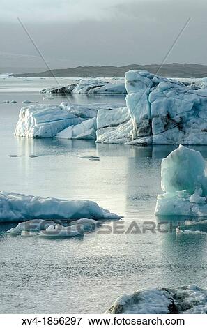 Icebergs in Jokulsarl? n glacial lagoon Iceland View Large Photo Image Stock Photo - Icebergs in Jokulsarl? n glacial lagoon Iceland. Fotosearch