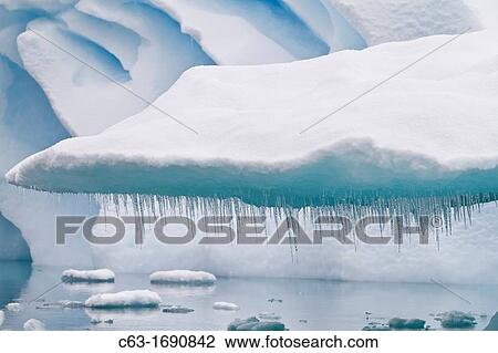 Stock Image - Icebergs near the Antarctic Peninsula during the summer months, Antarctica, Southern Ocean. Fotosearch