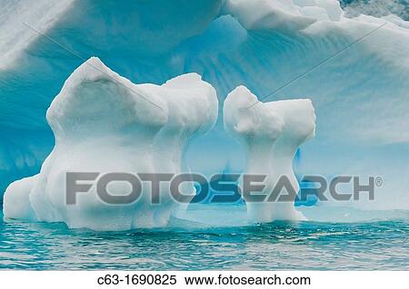 Stock Photography - Icebergs near the Antarctic Peninsula during the summer months, Antarctica, Southern Ocean. Fotosearch