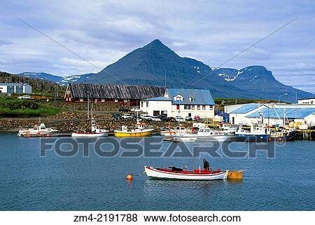 Stock Photo - ICELAND, EAST COAST, DJUPAVOGUR FISHING VILLAGE, VIEW OF DOCK AND FISH FACTORY.. Fotosearch