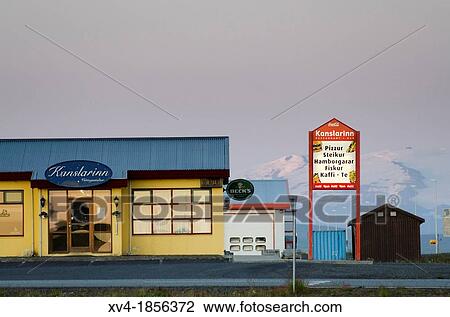 Iceland, Hella, Shop with Signs Glowing at Dusk View Large Photo Image Stock Image - Iceland, Hella, Shop with Signs Glowing at Dusk. Fotosearch