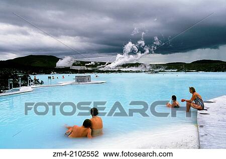 ICELAND, NEAR REYKJAVIK, BLUE LAGOON THERMAL AREA, SPA, PEOPLE IN POOL, POWER STATION IN BACKGROUND. View Large Photo Image Stock Image - ICELAND, NEAR REYKJAVIK, BLUE LAGOON THERMAL AREA, SPA, PEOPLE IN POOL, POWER STATION IN BACKGROUND.. Fotosearch