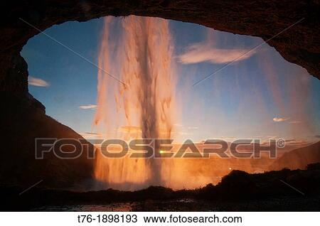 Iceland, Skogar, Beautiful Seljalandfoss waterfall at sunset View Large Photo Image Stock Image - Iceland, Skogar, Beautiful Seljalandfoss waterfall at sunset. Fotosearch