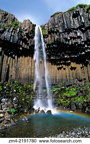 ICELAND, SOUTH COAST, SKAFTAFELL NATIONAL PARK, SVARTIFOSS WATERFALL, BASALT COLUMNS. View Large Photo Image Stock Image - ICELAND, SOUTH COAST, SKAFTAFELL NATIONAL PARK, SVARTIFOSS WATERFALL, BASALT COLUMNS.. Fotosearch