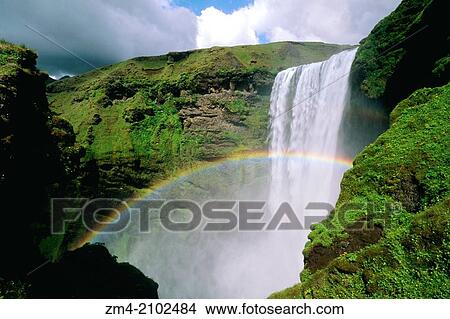 ICELAND, SOUTH COAST, SKOGARFOSS WATERFALL, RAINBOW. View Large Photo Image Picture - ICELAND, SOUTH COAST, SKOGARFOSS WATERFALL, RAINBOW.. Fotosearch
