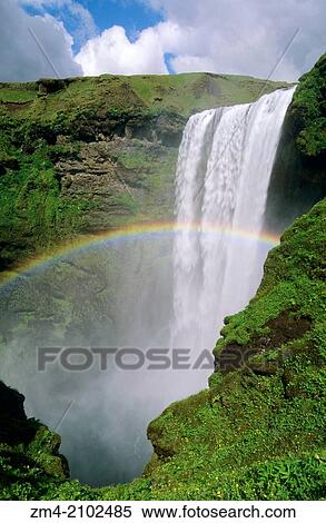 ICELAND, SOUTH COAST, SKOGARFOSS WATERFALL, RAINBOW. View Large Photo Image Stock Photography - ICELAND, SOUTH COAST, SKOGARFOSS WATERFALL, RAINBOW.. Fotosearch