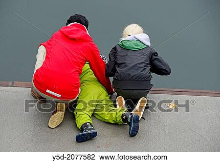 Stock Image - Icelandic people love to fish directly from waters of Atlantic Ocean, they don't even need a rod for fishing, they just fish using very simple tool. Fotosearch