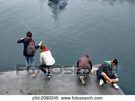 Icelandic people love to fish directly from waters of Atlantic Ocean, they don? t even need a rod for fishing, they just fish using very simple tool - piece of wood wrapped with fishing plastic line ended with hook, Iceland, Europe, Arctic regions. View Large Photo Image Stock Photography - Icelandic people love to fish directly from waters of Atlantic Ocean, they don? t even need a rod for fishing, they just fish using very simple tool - piece of wood wrapped with fishing plastic line ended with hook, Iceland, Europe, Arctic regions.. Fotosearch