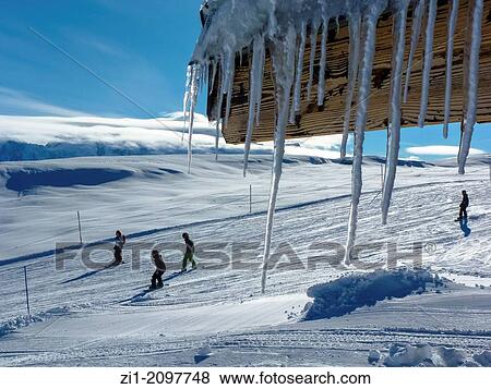 icicles and passing skiers at Flaine, France View Large Photo Image Stock Photo - icicles and passing skiers at Flaine, France. Fotosearch